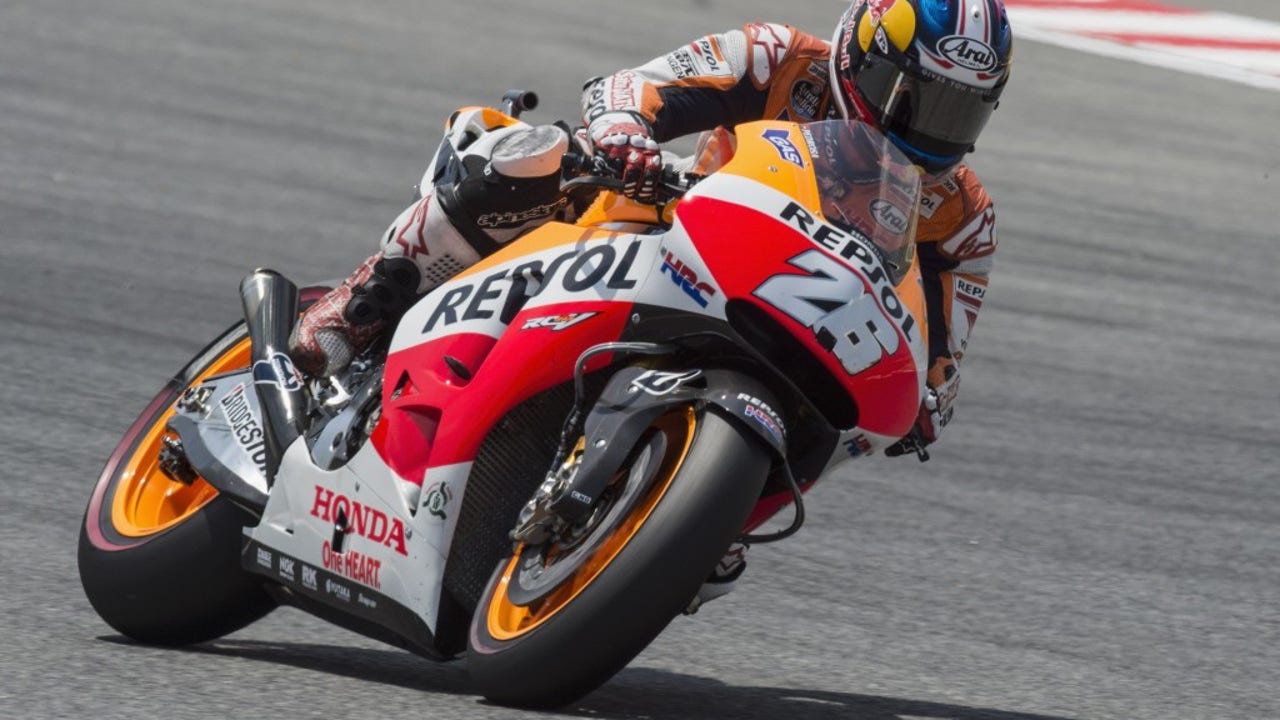 Pedrosa on MotoGP pole as Marquez streak ends with crash